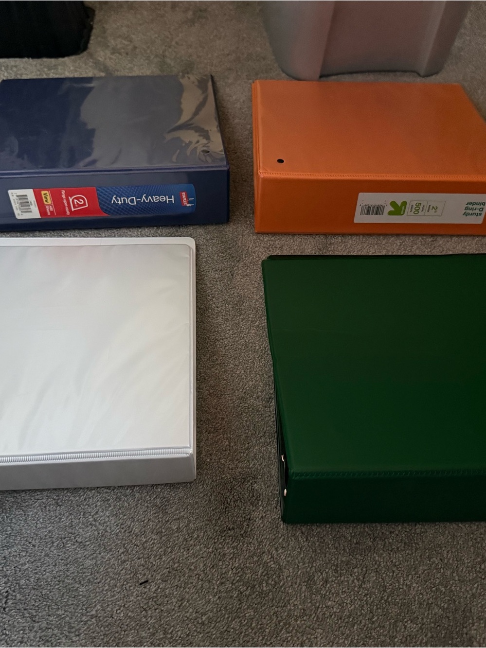 Assorted 3-Ring Binders in Blue, Orange, White, and Green